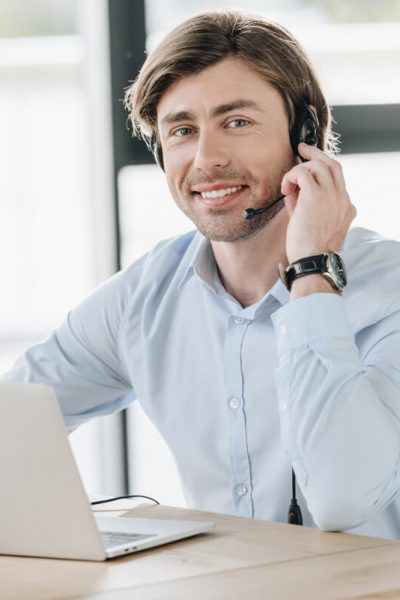 smiling-call-center-worker-with-laptop-looking-at-2021-08-29-22-51-33-utc.jpg smiling-call-center-worker-with-laptop-looking-at-2021-08-29-22-51-33-utc.jpg
